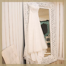 Image of floor length mirror with wedding dress - Whispering Oaks Wedding Venue