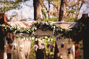 Image of arbor decorated - Whispering Oaks Wedding Venue